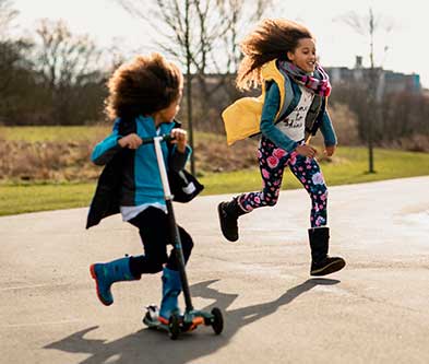 Two children playing outdoors